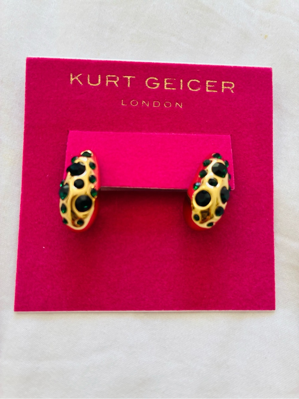 Kurt Geiger Gold with Green and Black Stones